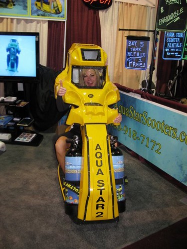 Ally trying a new toy at DEMA 2010 - DEMA 2010