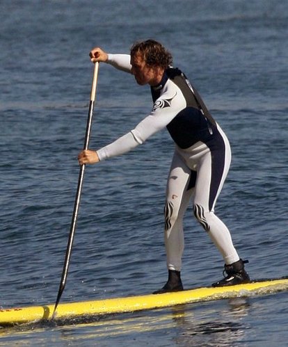 Mathew McConaughey in paddling action - Famous Faces