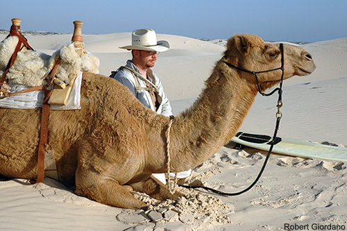 Our guide with one of his camels - Desert Adventure