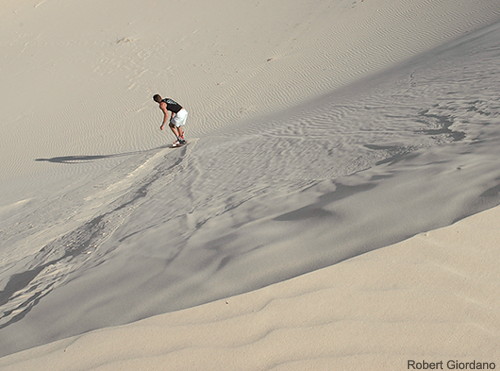 Mark heads down a dune - Desert Adventure