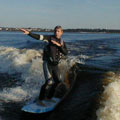 Ed Geary surfing behind his Moomba